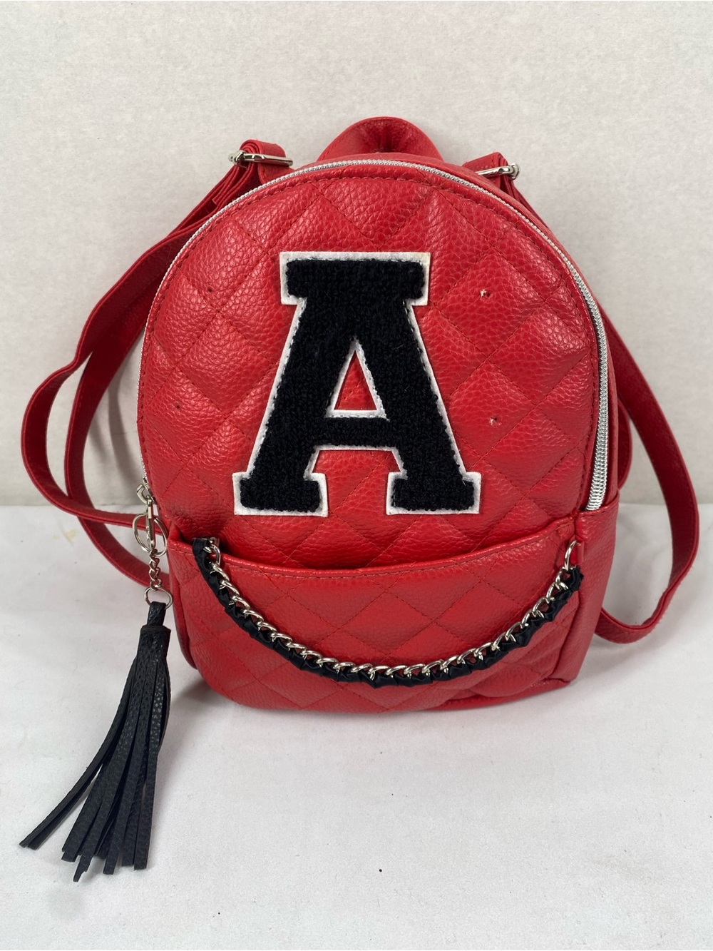 Justice Red Quilted Mini Backpack with Black Patch